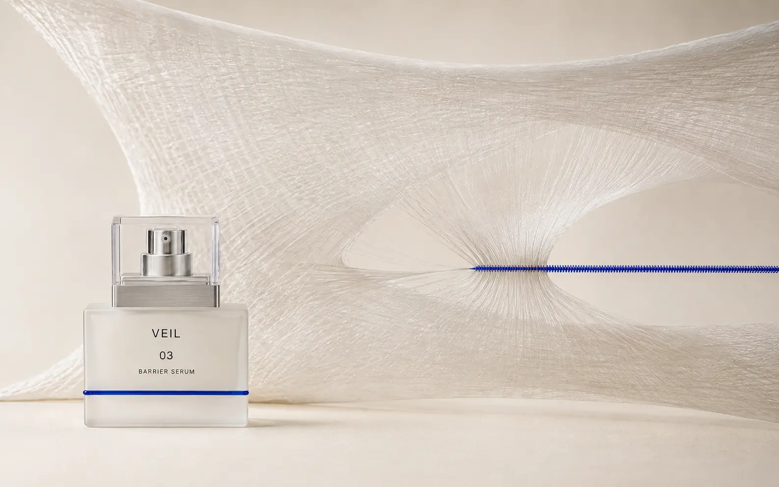 VEIL serum beside a monumental translucent membrane repairing along a cobalt seam